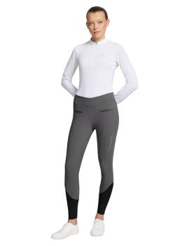mujer con pantalón de montar samshield alpha gris oscuro con calcetin negro