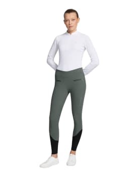 mujer con pantalón de montar samshield gaia verde bosque