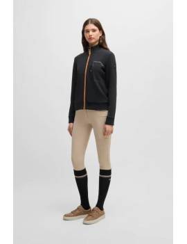 mujer con chaqueta con cremallera equitación mujer negro con ribete marrón boss equestrian ava