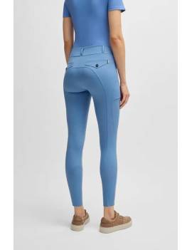 leggins equitación mujer con cinturón azul celeste boss equestrian hybrid visto desde atrás